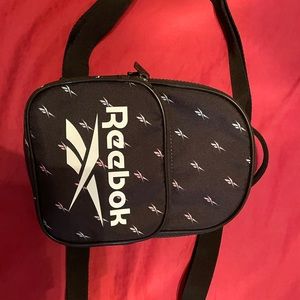 Black and white mini Reebok backpack
